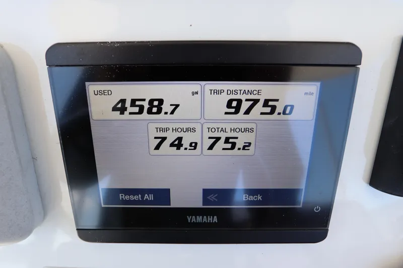 Slide: The Image of Yamaha display showing fuel usage, trip distance, and hours for Regulator 24XO boat. - 20