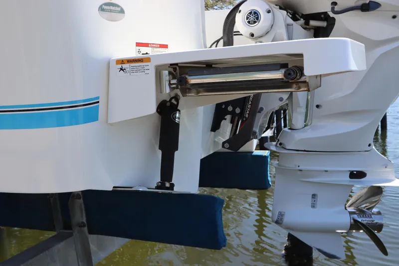 Slide: The Image of 2021 Regulator 24XO boat with Yamaha outboard motor and hydraulic lift system. - 5