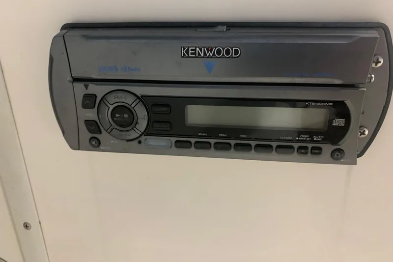 Slide: The Image of Kenwood marine stereo system in a 2007 Bryant 270 boat. - 13