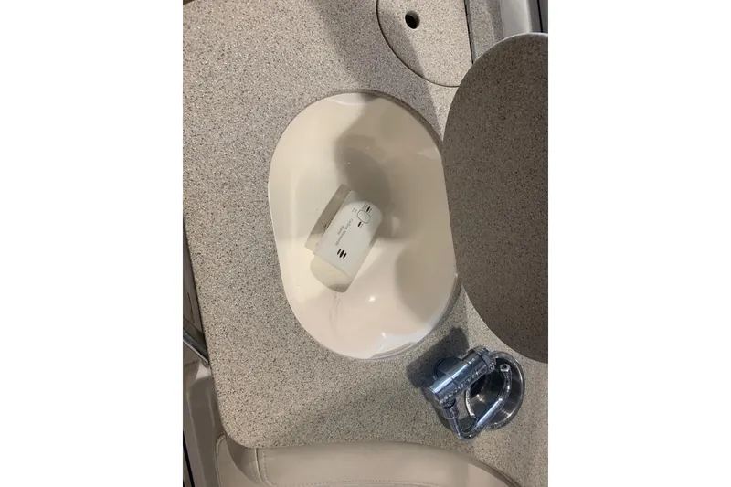 Slide: The Image of Sink with a small device inside, on a Bryant 270 boat, 2007 model. - 16