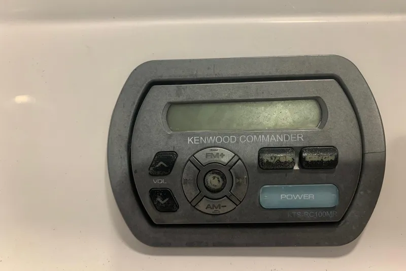Slide: The Image of Kenwood Commander audio control panel in a 2007 Bryant 270 boat. - 20