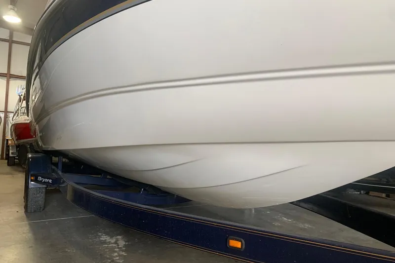 Slide: The Image of 2007 Bryant 270 boat on trailer in indoor storage facility. - 4