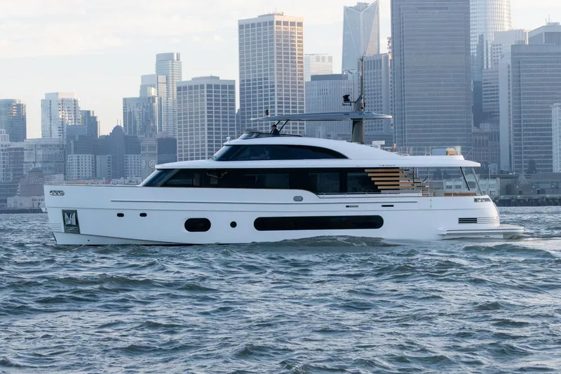 The Image of 2026 Azimut Magellano 25M yacht cruising near city skyline. - 0