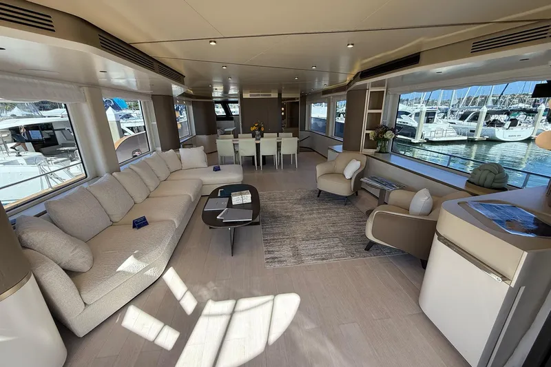 Slide: The Image of Luxurious interior of 2026 Azimut Magellano 25M yacht with elegant seating and dining area. - 103