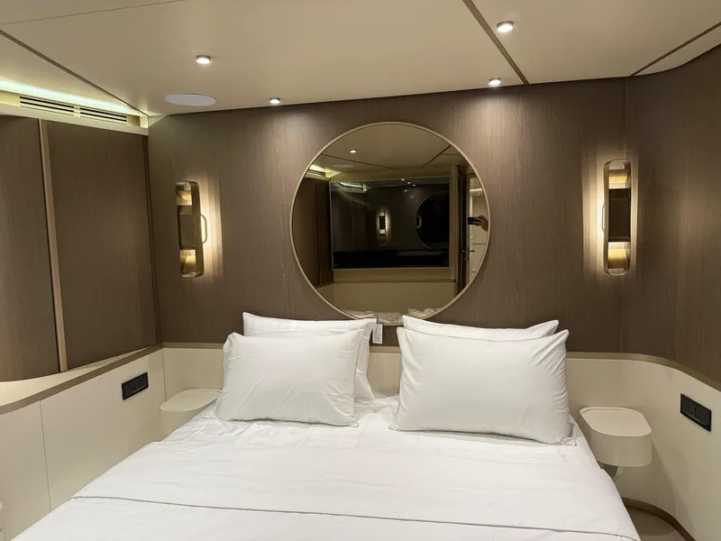 Slide: The Image of Luxurious bedroom interior of 2026 Azimut Magellano 25M yacht with modern design elements. - 20