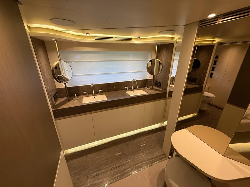 Slide: The Image of Luxurious bathroom interior of 2026 Azimut Magellano 25M yacht with dual sinks and modern design. - 24