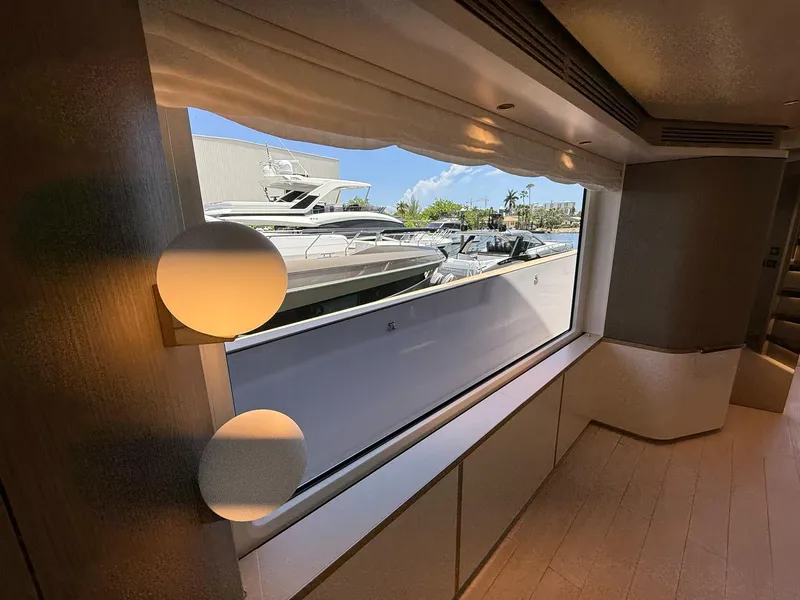 Slide: The Image of Interior view of 2026 Azimut Magellano 25M yacht with window overlooking marina. - 37
