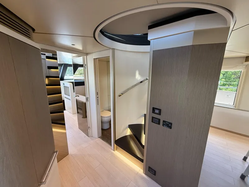 Slide: The Image of Luxurious interior of 2026 Azimut Magellano 25M yacht with modern design and elegant staircase. - 38