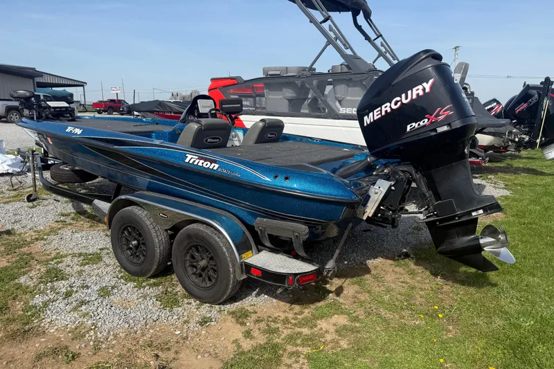 Slide: The Image of 2006 Triton Tr-196 SC boat with Mercury Pro XS engine on trailer. - 5