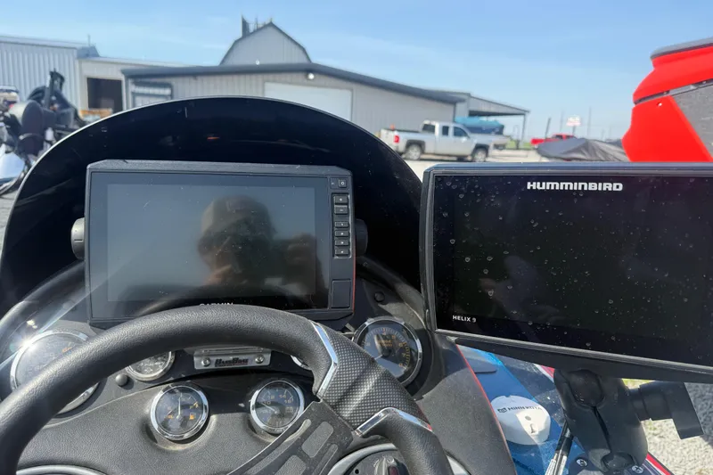 Slide: The Image of Dashboard of a 2006 Triton Tr-196 SC boat with Humminbird Helix 9 display. - 8