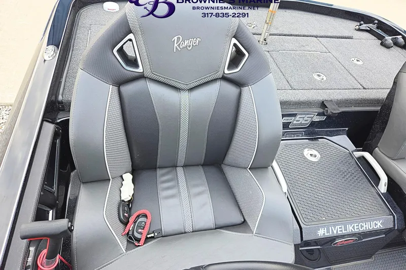 Slide: The Image of 2023 Ranger Z520R boat seat with gray upholstery and #LIVELIKECHUCK decal. - 10