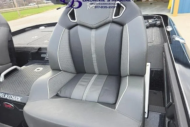 Slide: The Image of 2023 Ranger Z520R boat seat with sleek black and gray design. - 11