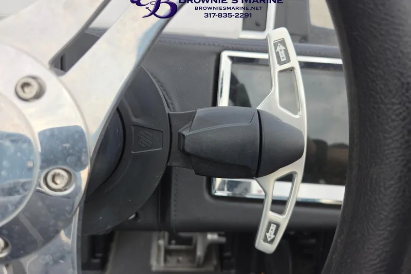 Slide: The Image of Close-up of 2023 Ranger Z520R steering wheel and controls. - 13