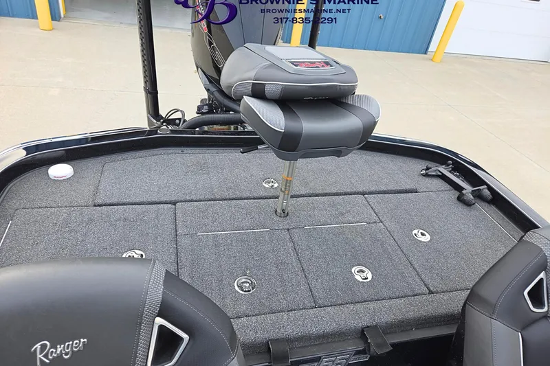 Slide: The Image of 2023 Ranger Z520R boat deck with seating and storage compartments. - 15