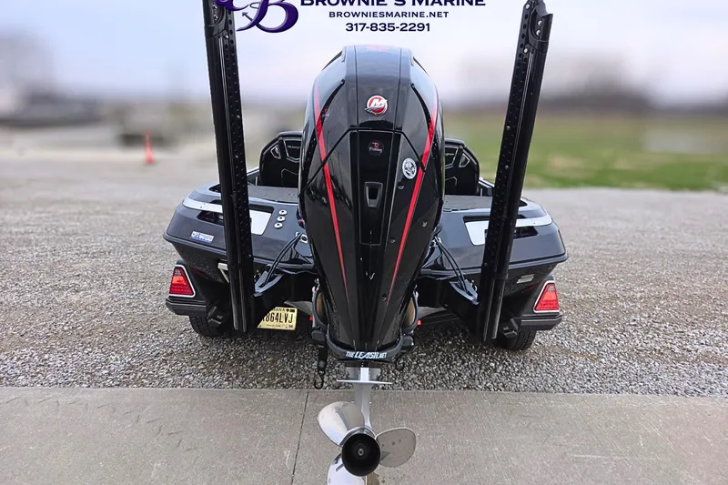 Slide: The Image of 2023 Ranger Z520R boat rear view with motor and dual power poles. - 20