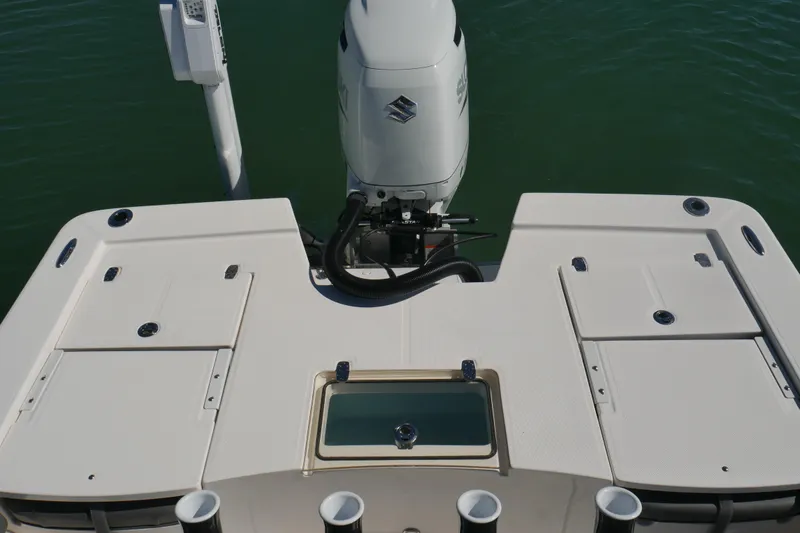 Slide: The Image of 2023 Sea Born FX24 Bay boat with Suzuki outboard motor, rear deck view. - 23