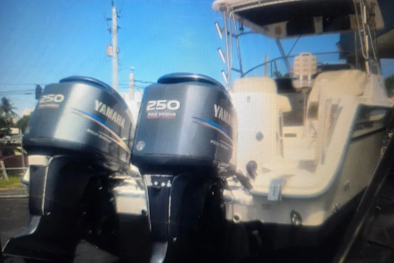 Slide: The Image of 2004 Grady-White Express 330 boat with twin Yamaha 250 outboard engines. - 10