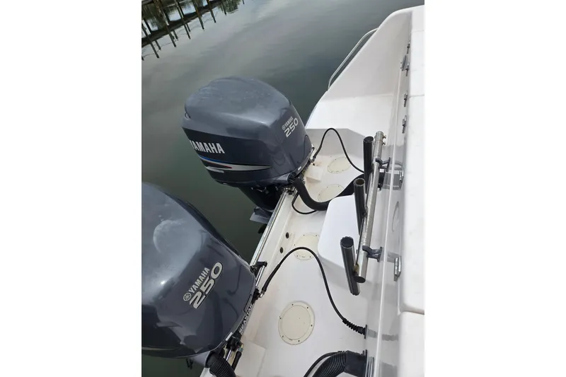 Slide: The Image of 2004 Grady-White Express 330 boat with twin Yamaha 250 outboard motors. - 11