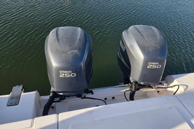 Slide: The Image of Twin Yamaha 250 outboard engines on a 2004 Grady-White Express 330 boat. - 7