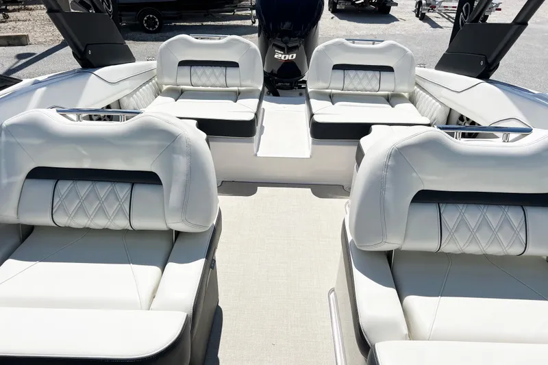 Slide: The Image of 2022 Regal LX2 boat interior with luxurious white seating and modern design. - 5