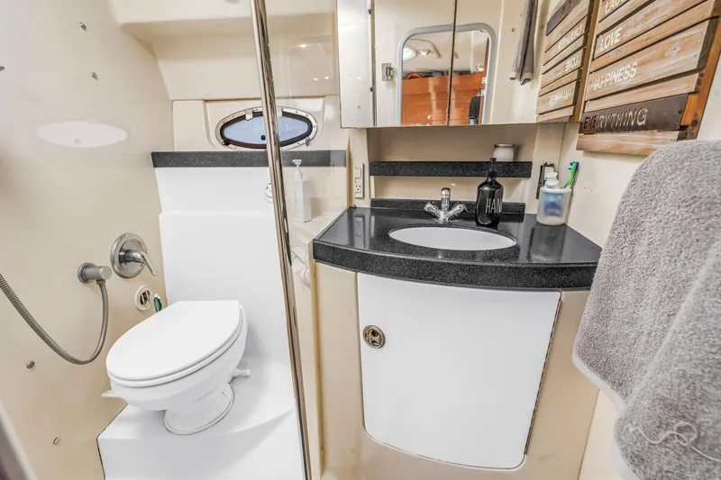 Slide: The Image of 2007 Regal Commodore 3760 IB bathroom with toilet, sink, and modern fixtures. - 11