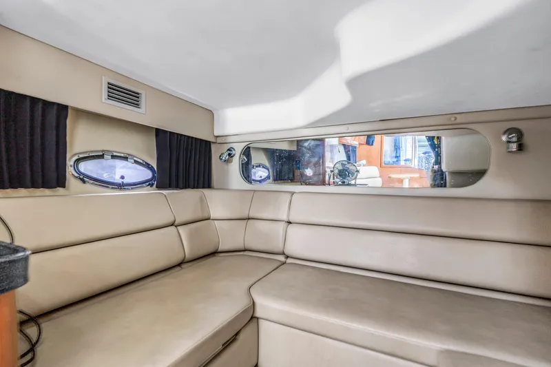 Slide: The Image of Luxurious interior of 2007 Regal Commodore 3760 IB yacht with beige seating. - 14