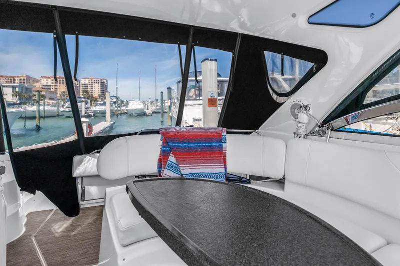 Slide: The Image of Interior of 2007 Regal Commodore 3760 IB yacht with marina view. - 22
