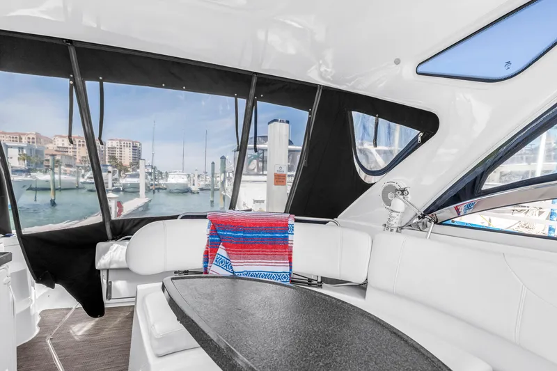 Slide: The Image of Interior of 2007 Regal Commodore 3760 IB yacht with marina view. - 23