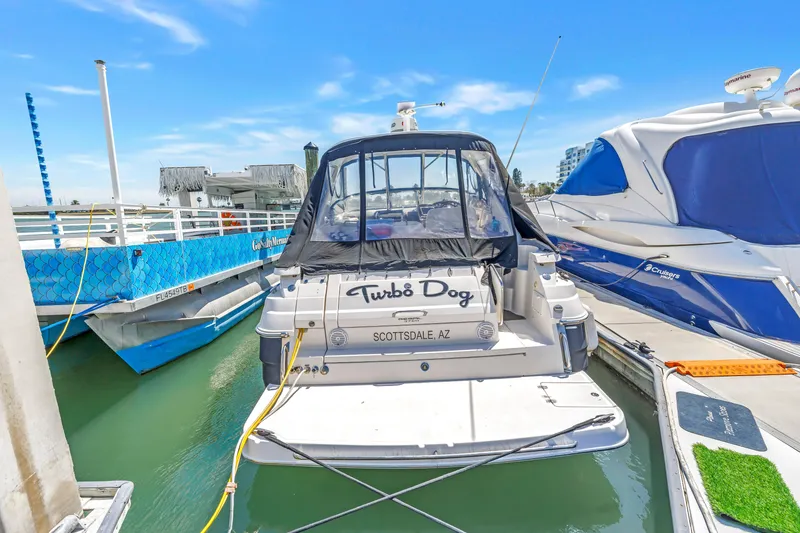 Slide: The Image of 2007 Regal Commodore 3760 IB docked, featuring "Turbo Dog" name, Scottsdale, AZ. - 4