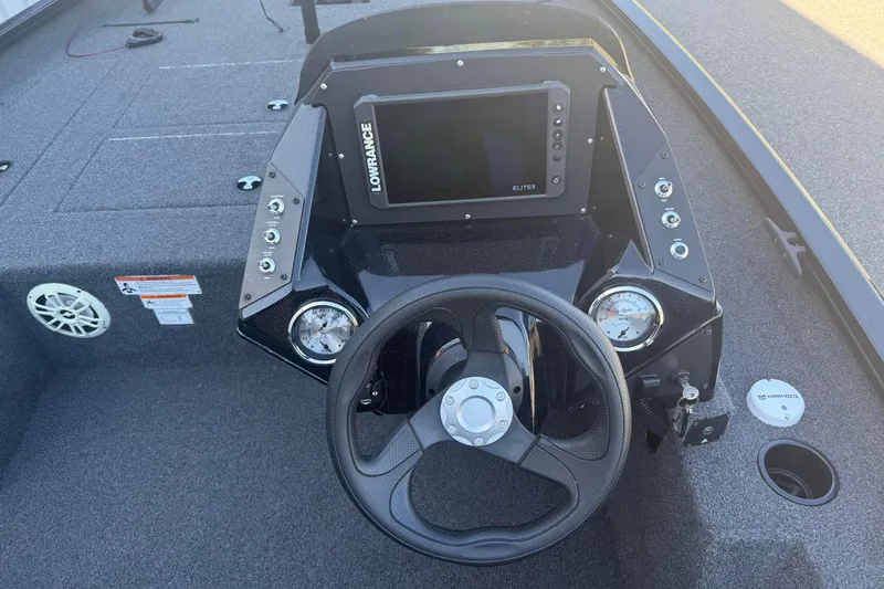 Slide: The Image of 2021 Crestliner XF 179 boat dashboard with Lowrance Elite display and steering wheel. - 10