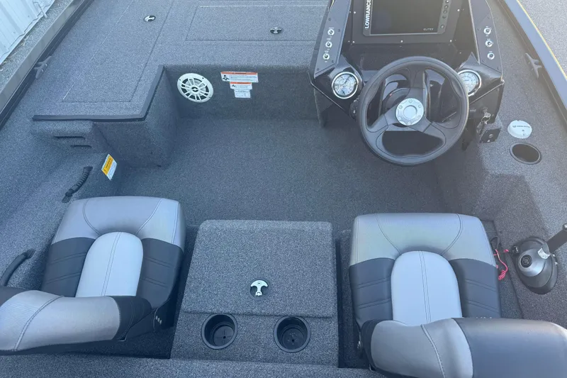 Slide: The Image of 2021 Crestliner XF 179 boat interior with steering console and seating. - 13