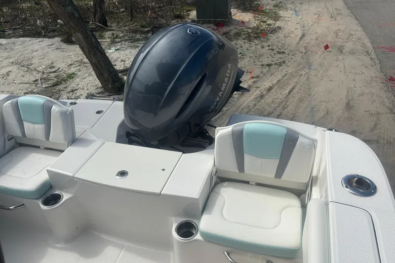 Slide: The Image of 2023 Robalo R200 Center Console boat with Yamaha engine, featuring comfortable seating. - 13