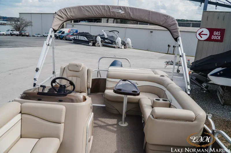 Slide: The Image of 2013 Bennington 20 SL pontoon boat with beige seating at Lake Norman Marina. - 11
