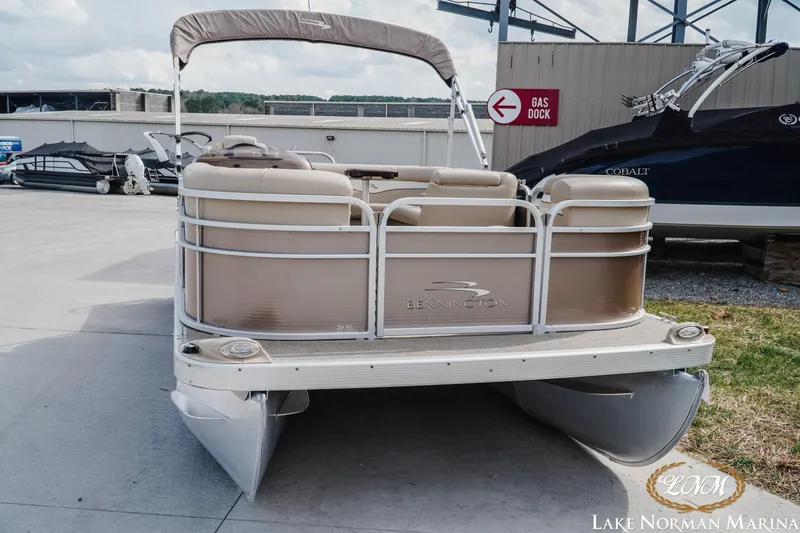 Slide: The Image of 2013 Bennington 20 SL pontoon boat at Lake Norman Marina, near gas dock. - 4