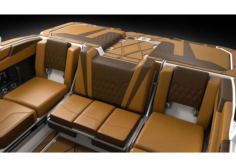 Slide: The Image of Manufacturer Provided Image: Luxurious interior of 2026 Malibu M230 boat with brown leather seating. - 16