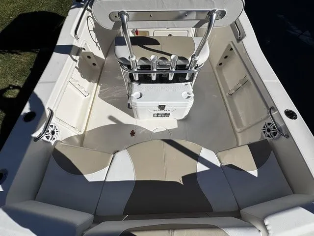 Slide: The Image of 2025 Bulls Bay 200CC boat interior with seating and rod holders. - 5