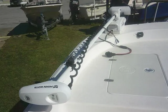 Slide: The Image of 2011 Carolina Skiff 258 DLV with Minn Kota trolling motor on deck. - 18