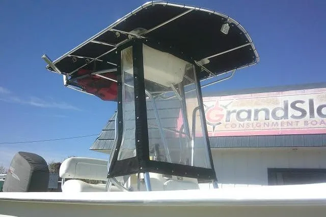 Slide: The Image of 2011 Carolina Skiff 258 DLV boat with T-top and console enclosure. - 5