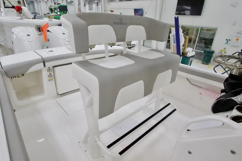 Slide: The Image of 2026 Regulator 23 boat interior with dual seating and modern design. - 16