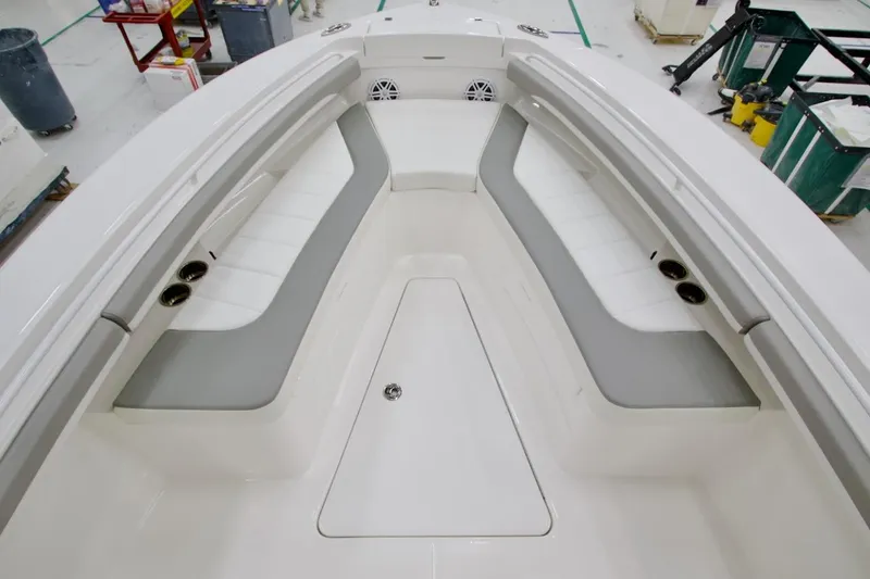 Slide: The Image of Interior view of 2026 Regulator 23 boat, featuring spacious seating and modern design. - 26