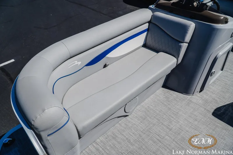 Slide: The Image of 2021 Bennington 188 SVL pontoon boat interior with gray seating at Lake Norman Marina. - 12