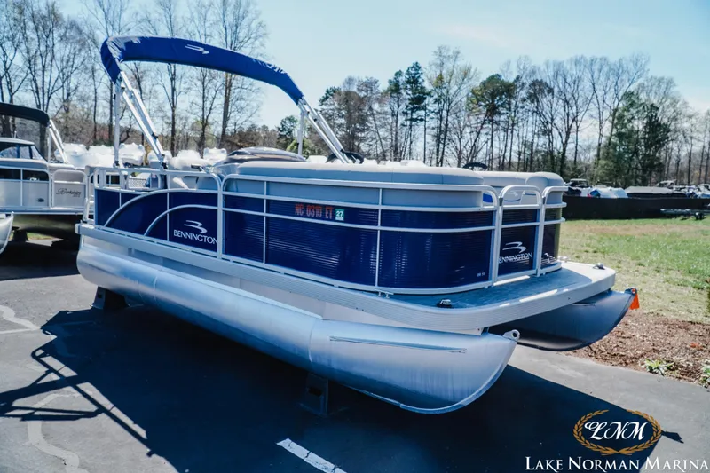 Slide: The Image of 2021 Bennington 188 SVL pontoon boat displayed at Lake Norman Marina. - 3