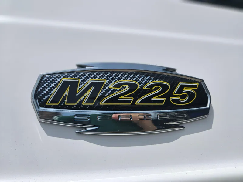 Slide: The Image of 2025 Monterey M-225 emblem on a sleek surface, showcasing modern design. - 25