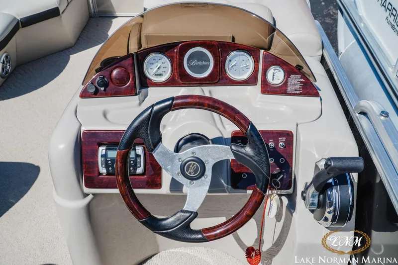 Slide: The Image of Steering console of a 2013 Berkshire 190CL boat at Lake Norman Marina. - 10