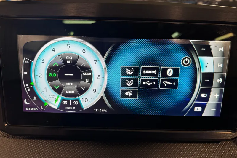 Slide: The Image of Dashboard display of 2021 Scarab 285 ID boat with digital controls and gauges. - 15