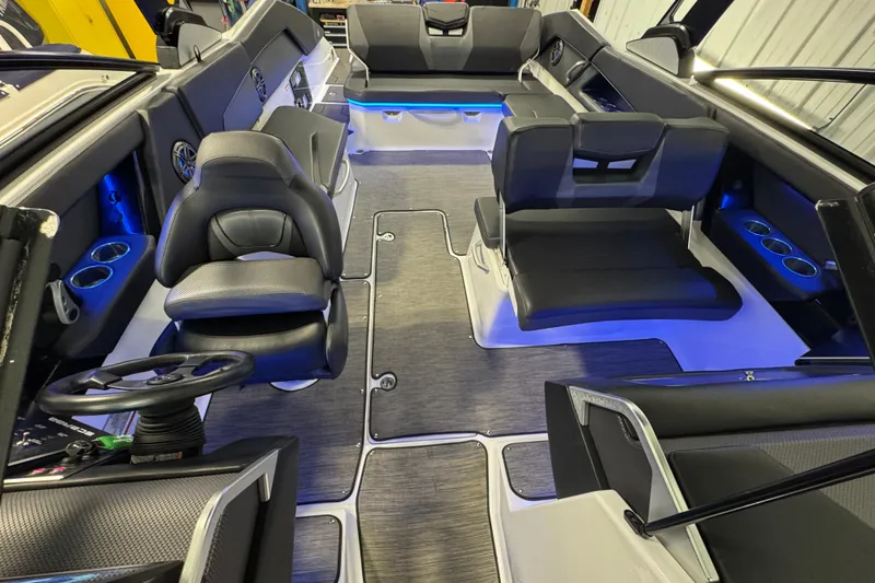 Slide: The Image of Interior of 2021 Scarab 285 ID boat with modern seating and ambient lighting. - 24