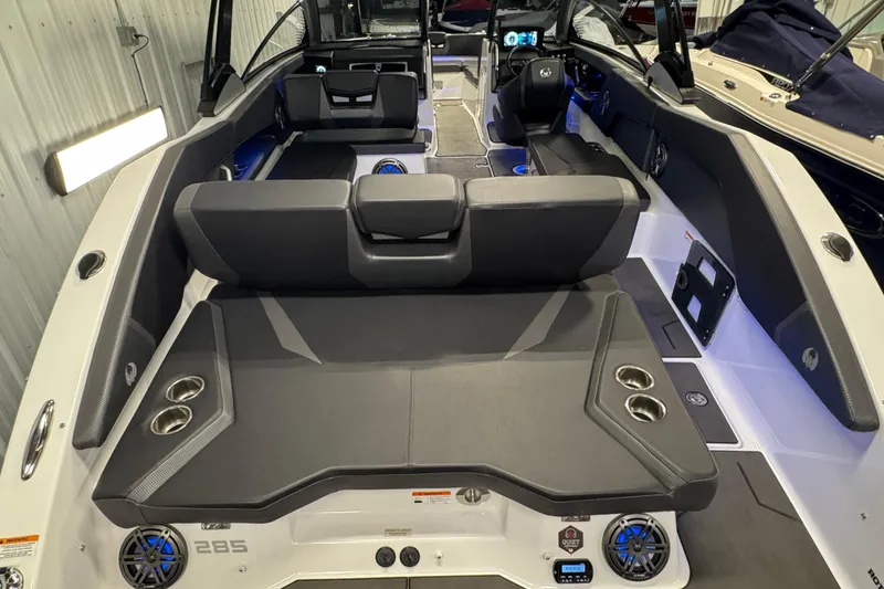 Slide: The Image of 2021 Scarab 285 ID boat interior with sleek seating and modern dashboard. - 28