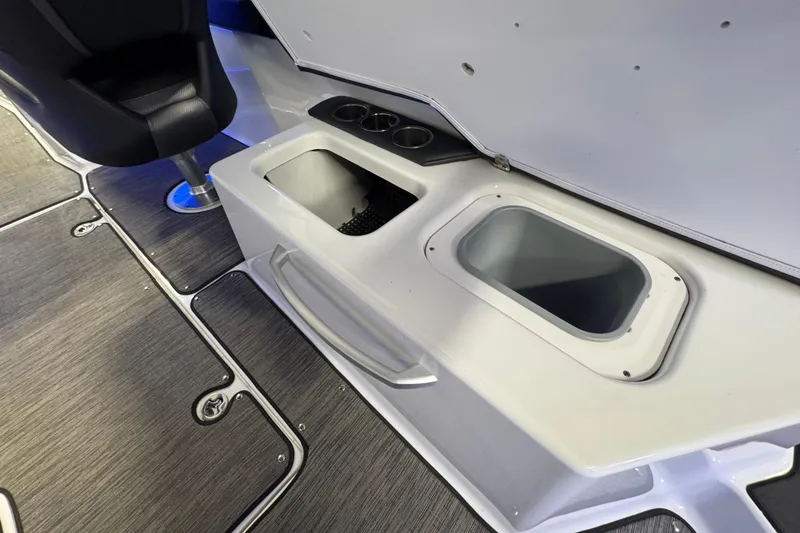 Slide: The Image of Interior of 2021 Scarab 285 ID boat showing seating and storage compartments. - 32