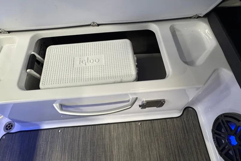 Slide: The Image of Storage compartment with Igloo cooler in 2021 Scarab 285 ID boat. - 9