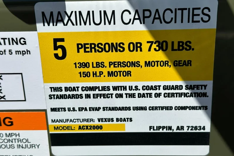 Slide: The Image of Vexus ACX 2000 boat capacity label, 5 persons or 730 lbs, 2026 model. - 10